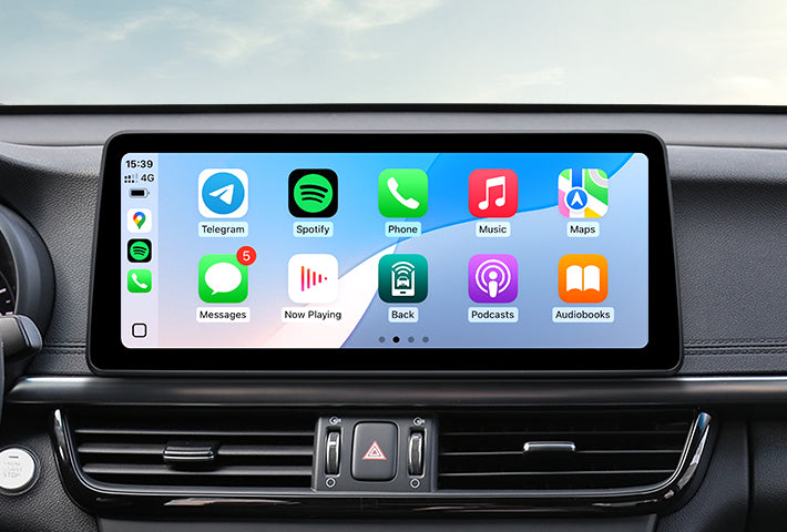 In-car view showing the wireless Apple CarPlay interface on a Toyota Sienna head unit touchscreen, displaying apps like Phone, Messages, Maps, and Spotify for easy access while driving.