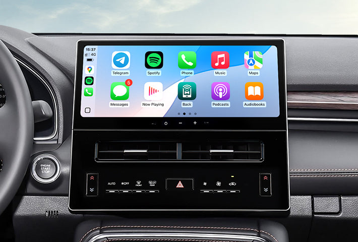In-car view showing the wireless Apple CarPlay interface on a Toyota Sienna head unit touchscreen, displaying apps like Phone, Messages, Maps, and Spotify for easy access while driving.