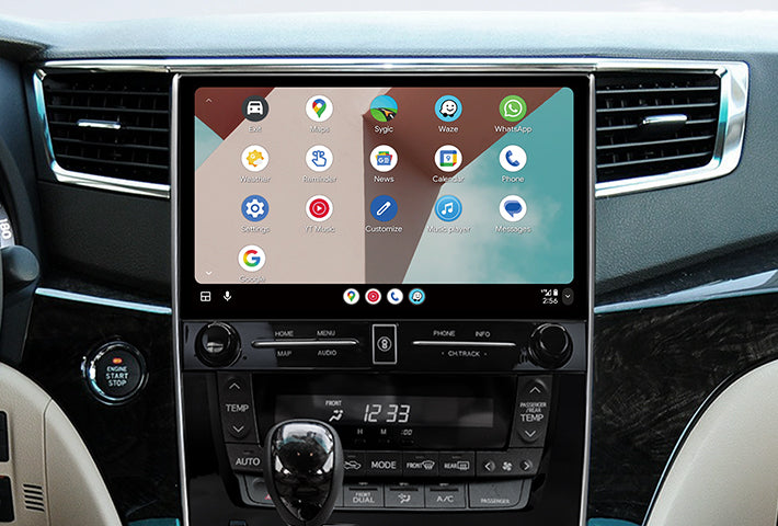 In-car view showing the Android Auto interface on a Toyota Sienna head unit, featuring a multi-pane layout with navigation and communication apps, compatible with both wired and wireless connections.