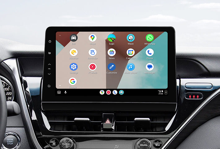 In-car view showing the Android Auto interface on a Toyota Sienna head unit, featuring a multi-pane layout with navigation and communication apps, compatible with both wired and wireless connections.