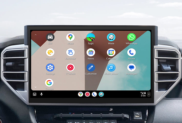 In-car view showing the Android Auto interface on a Toyota Sienna head unit, featuring a multi-pane layout with navigation and communication apps, compatible with both wired and wireless connections.